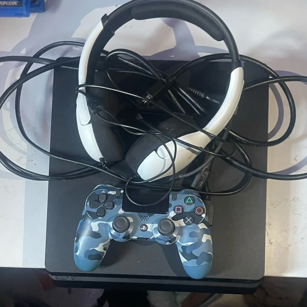PS4 and Monitor with games